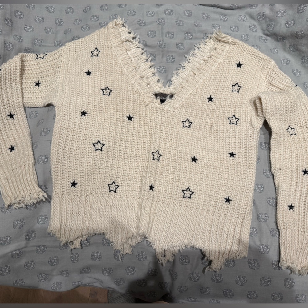 White V-Neck Sweater with Star Accents